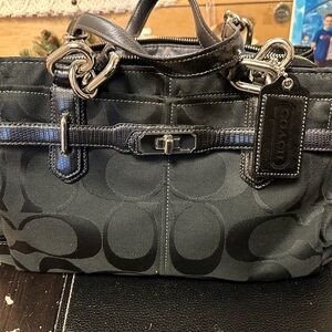 Women’s black coach hand bag